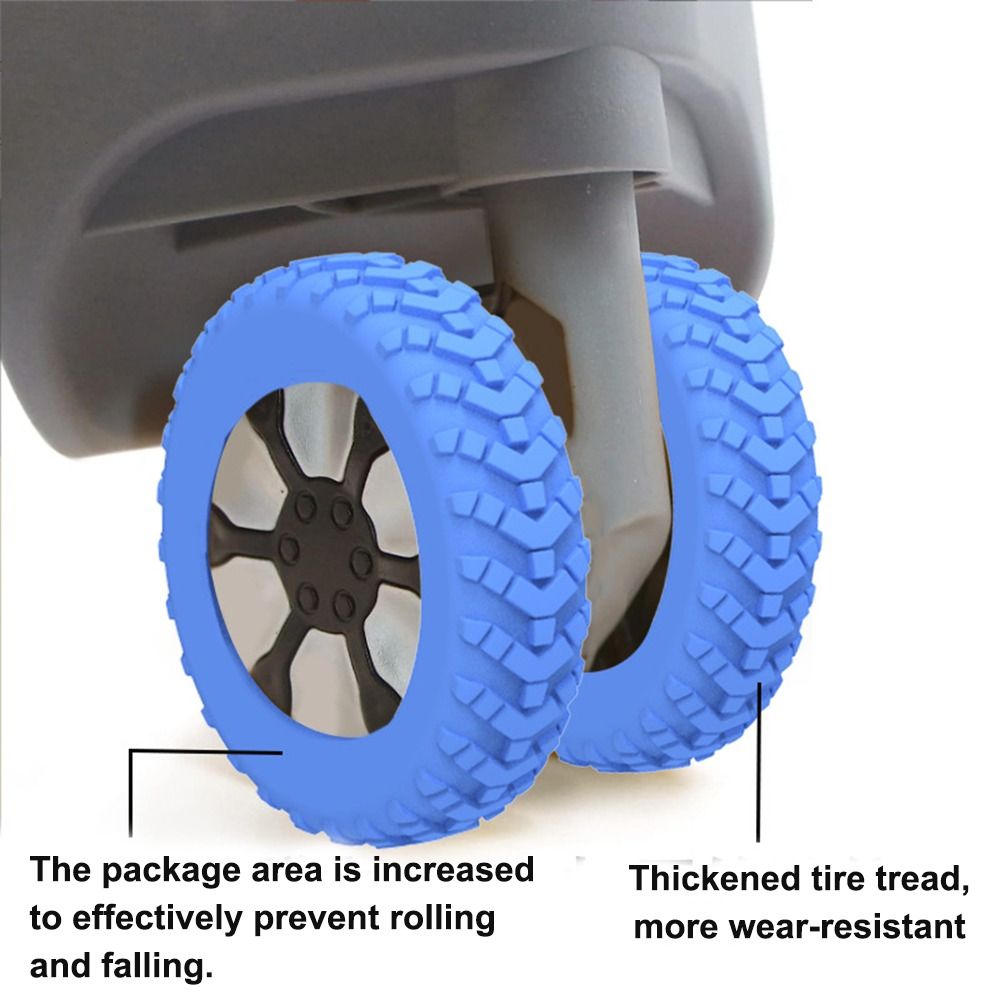 Blue rubber luggage wheel covers installed on suitcase wheels, showing thickened tread for enhanced wear resistance and stability.