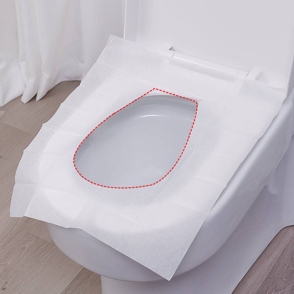 Disposable toilet seat cover placed on a toilet seat, showing full coverage for sanitary protection in public or shared bathrooms.