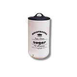 Muluthange ceramic storage canister labeled sugar with a black lid. Decorative and functional food storage bottle for kitchen use in Sri Lanka.