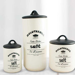 Set of Muluthange ceramic salt jars in various sizes with black lids, perfect for kitchen storage. Shop online at Bamagate.com.